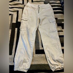 White elastic hem zip front pants
